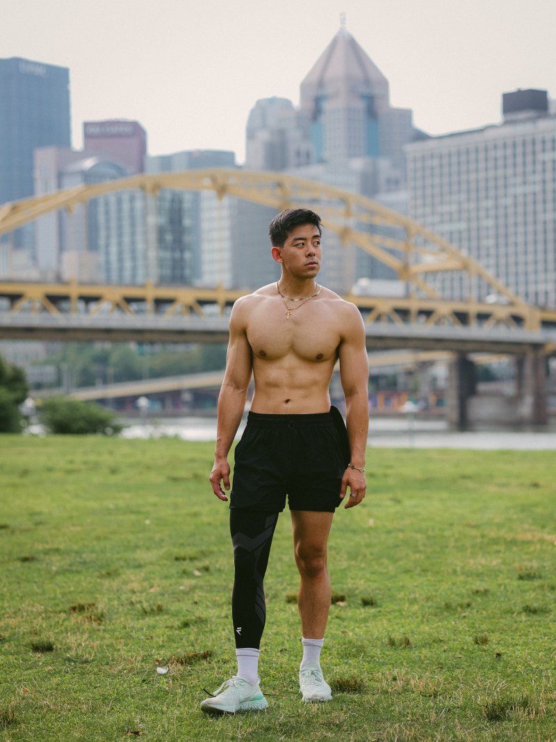 Environmental portrait on the riverfront with the Pittsburgh skyline behind